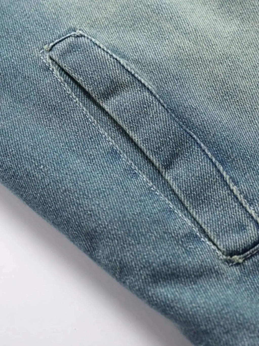 Men's denim jacket with faux fur collar, insulated rugged winter outerwear by Trendsi, featuring durable denim fabric and cozy lining.