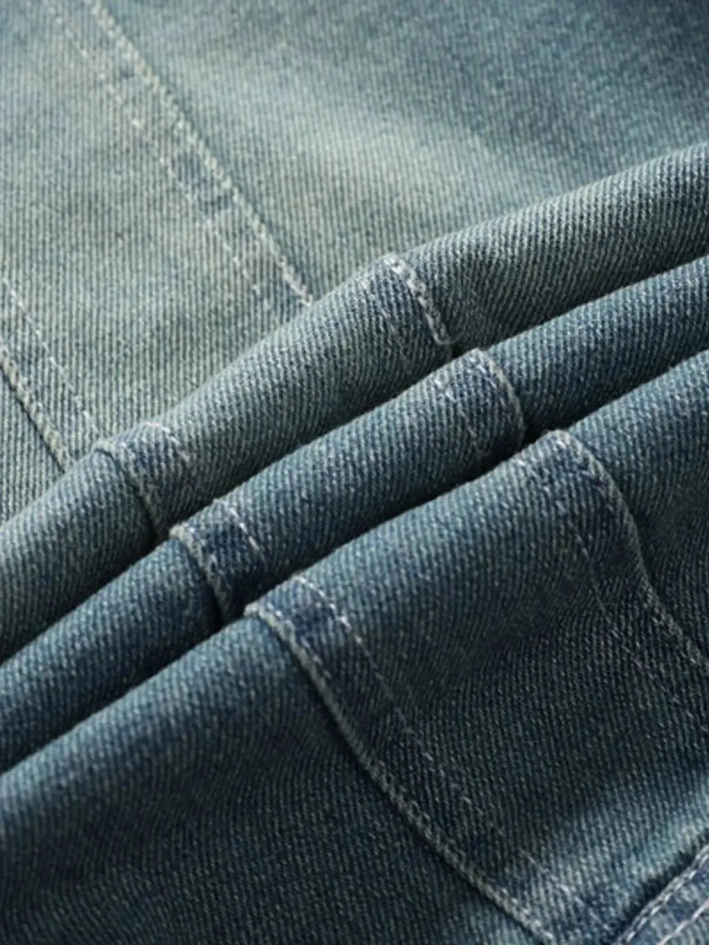Men's denim jacket with faux fur collar and insulation, rugged winter outerwear by Trendsi, suitable for cold weather.