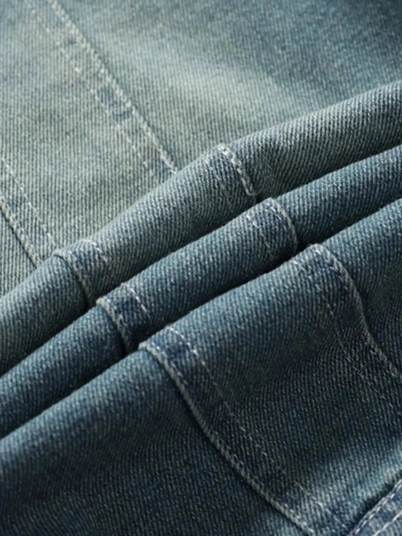 Men's denim jacket with faux fur collar and insulation, rugged winter outerwear by Trendsi, suitable for cold weather.