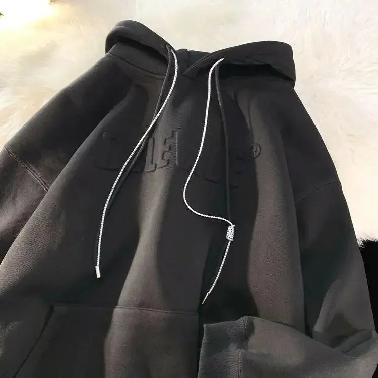 Men's oversized streetwear hoodie by Plush Fashion Hub featuring a relaxed fit and urban pullover design.