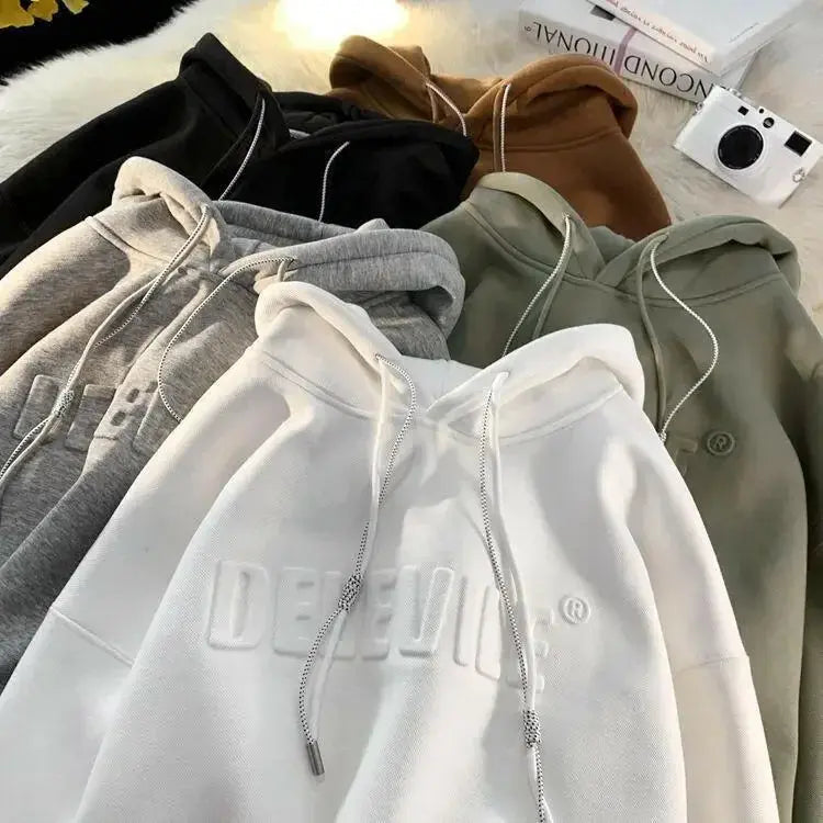 Men's oversized streetwear hoodie by Plush Fashion Hub, relaxed fit urban pullover with a hood and casual style.