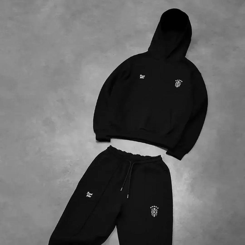 Men's casual hooded sweatshirt and jogger tracksuit set by Plush Fashion Hub, featuring a long hooded sweatshirt and matching sweatpants.