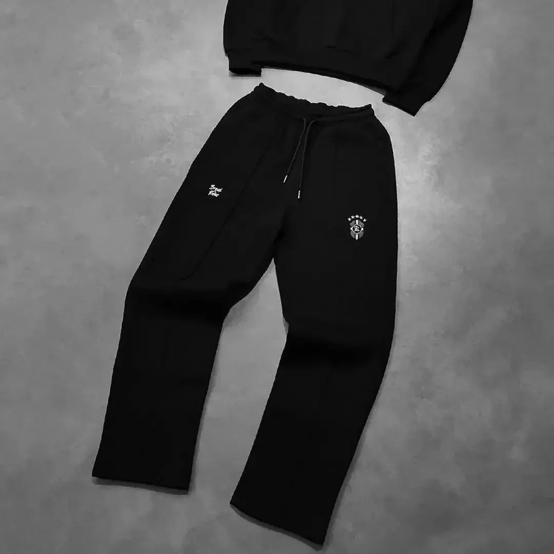 Men's casual hooded sweatshirt and jogger tracksuit set by Plush Fashion Hub, featuring a long hoodie and matching sweatpants.