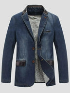 Plus size men's denim blazer with structured cotton blend fabric and lapel collar, stylish jacket from Trendsi.