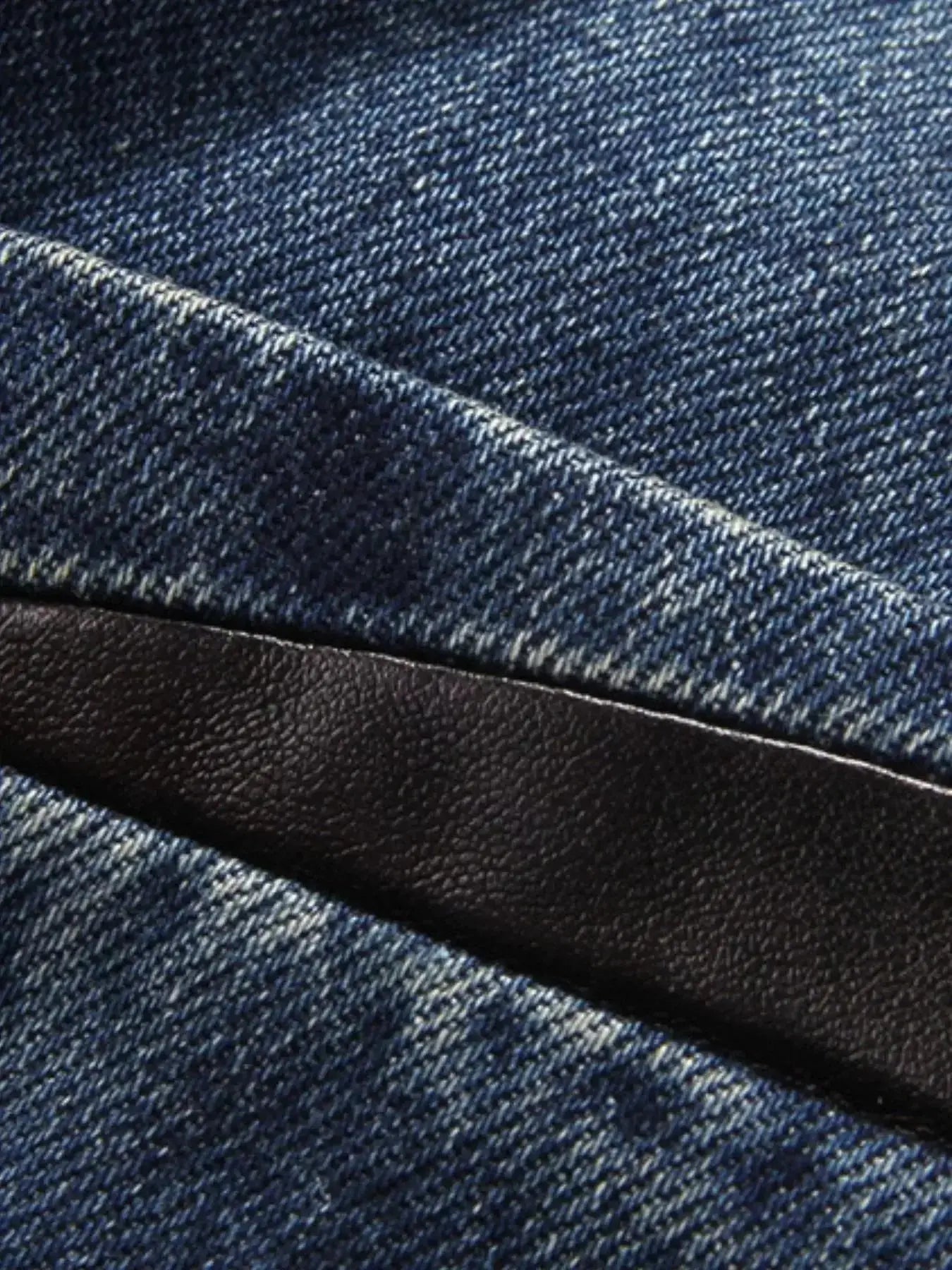 Men's plus size denim blazer with structured cotton blend fabric, lapel collar, and tailored fit from Trendsi.