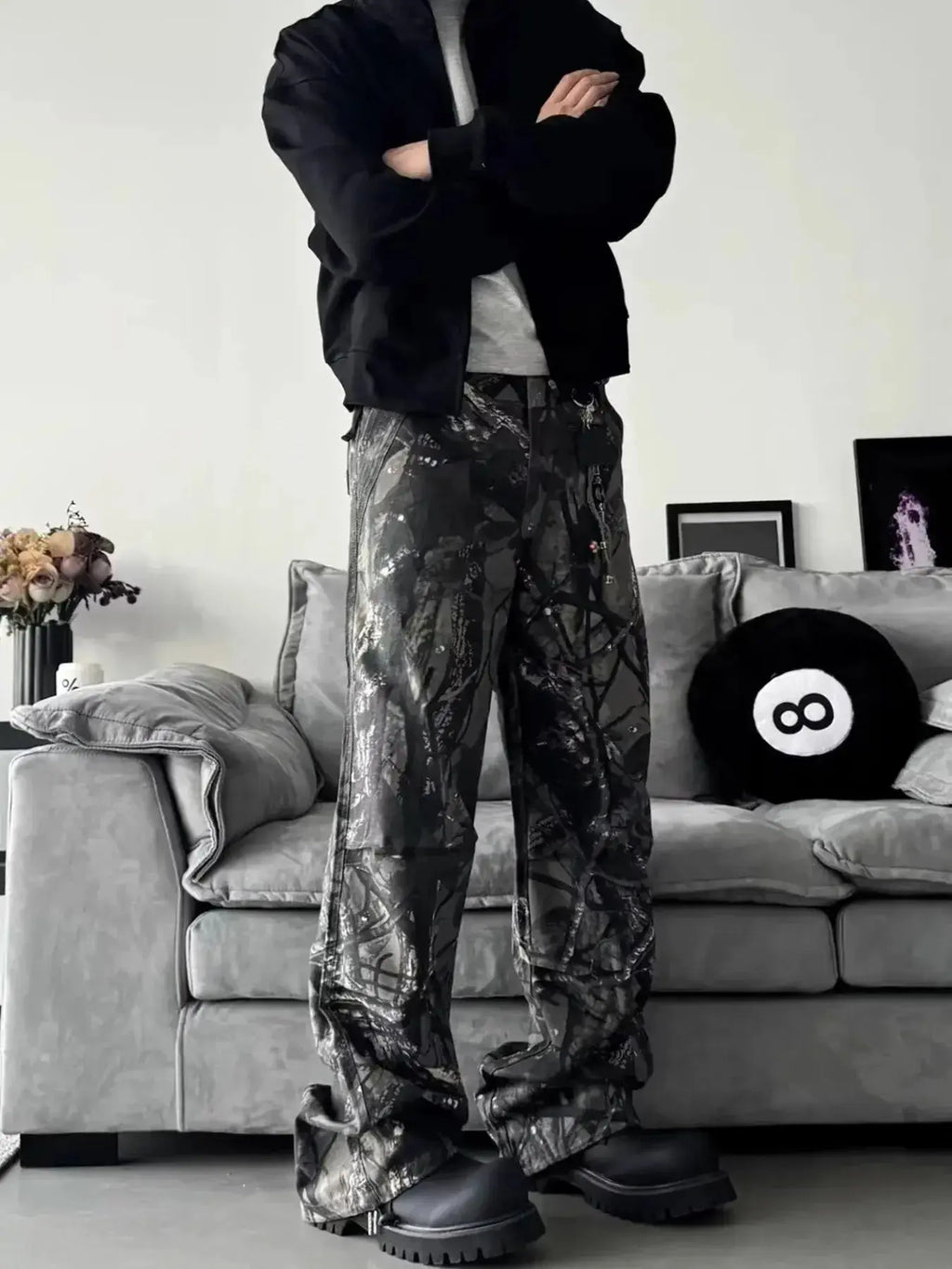 Men's relaxed fit camo print jeans with urban casual streetwear style, made of denim, featuring a comfortable fit and trendy camouflage pattern.