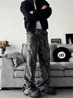 Men's relaxed fit camo print jeans with urban casual streetwear style, made of denim, featuring a comfortable fit and trendy camouflage pattern.