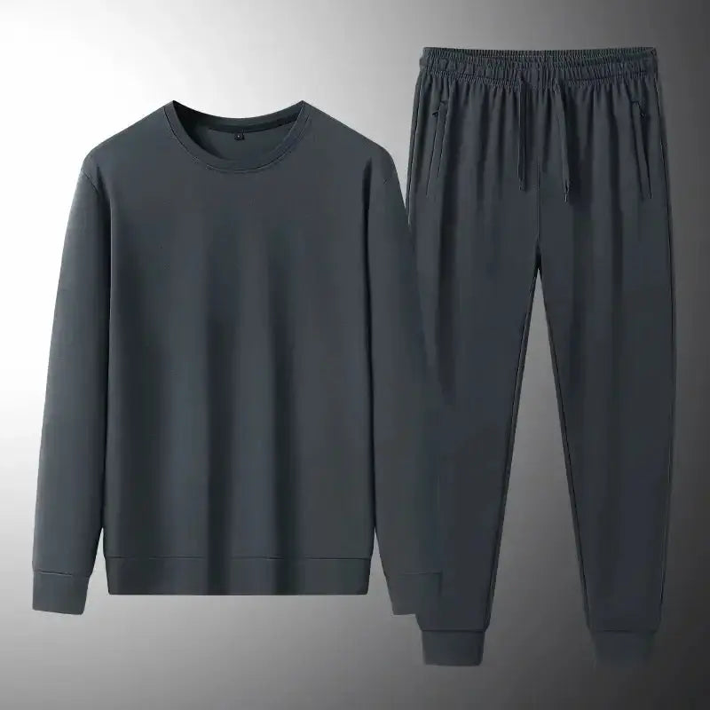 Men's plush fashion hub two-piece sweatshirt and jogger set, soft stretch lounge suit worn by a man in casual spring and autumn attire.