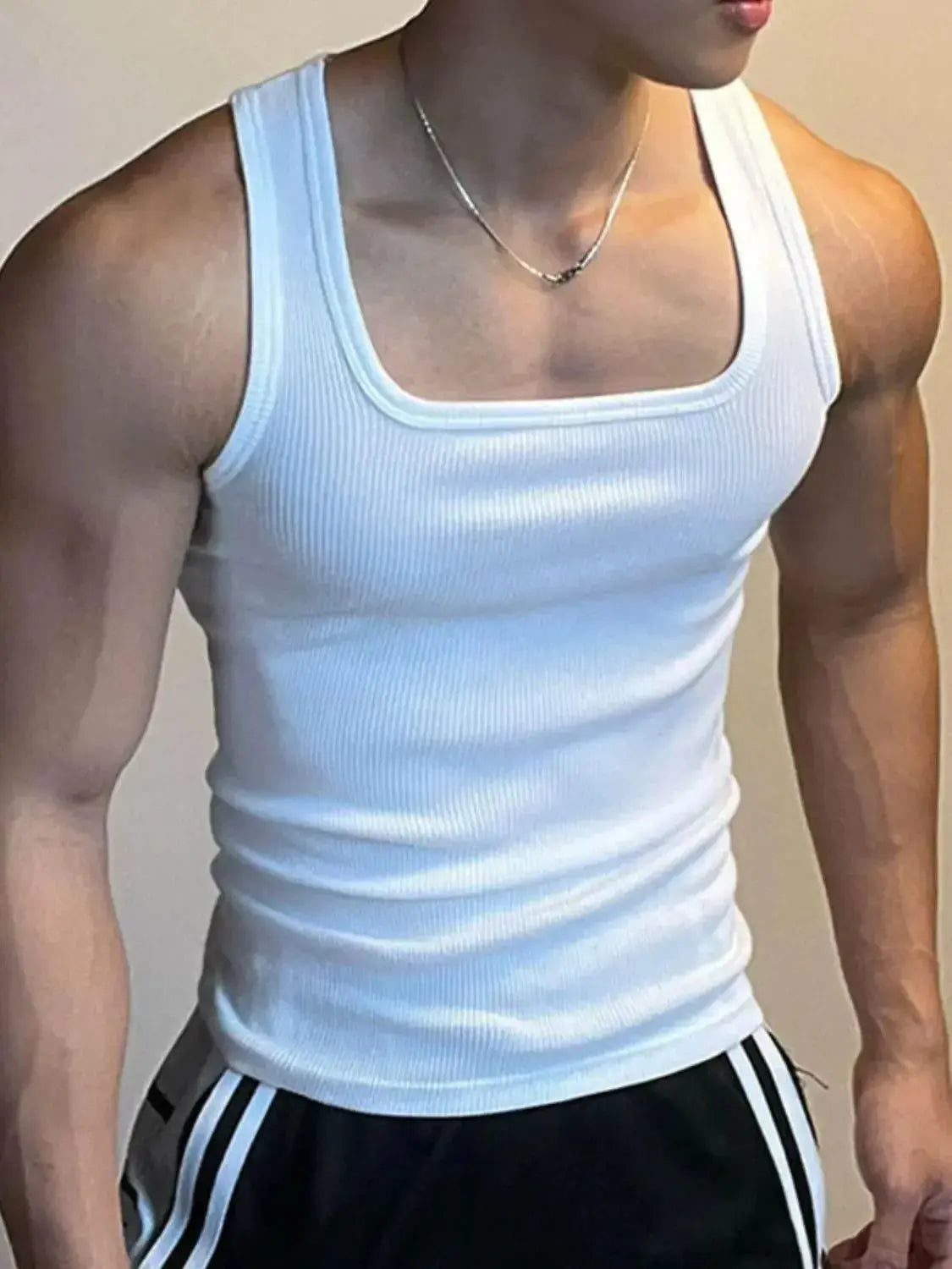 Men's square neck wide strap tank top by Plush Fashion Hub, breathable sleeveless athletic shirt with a relaxed fit.