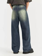 Men's vintage wash wide-leg denim jeans from Trendsi featuring relaxed fit cotton pants with a classic denim look.