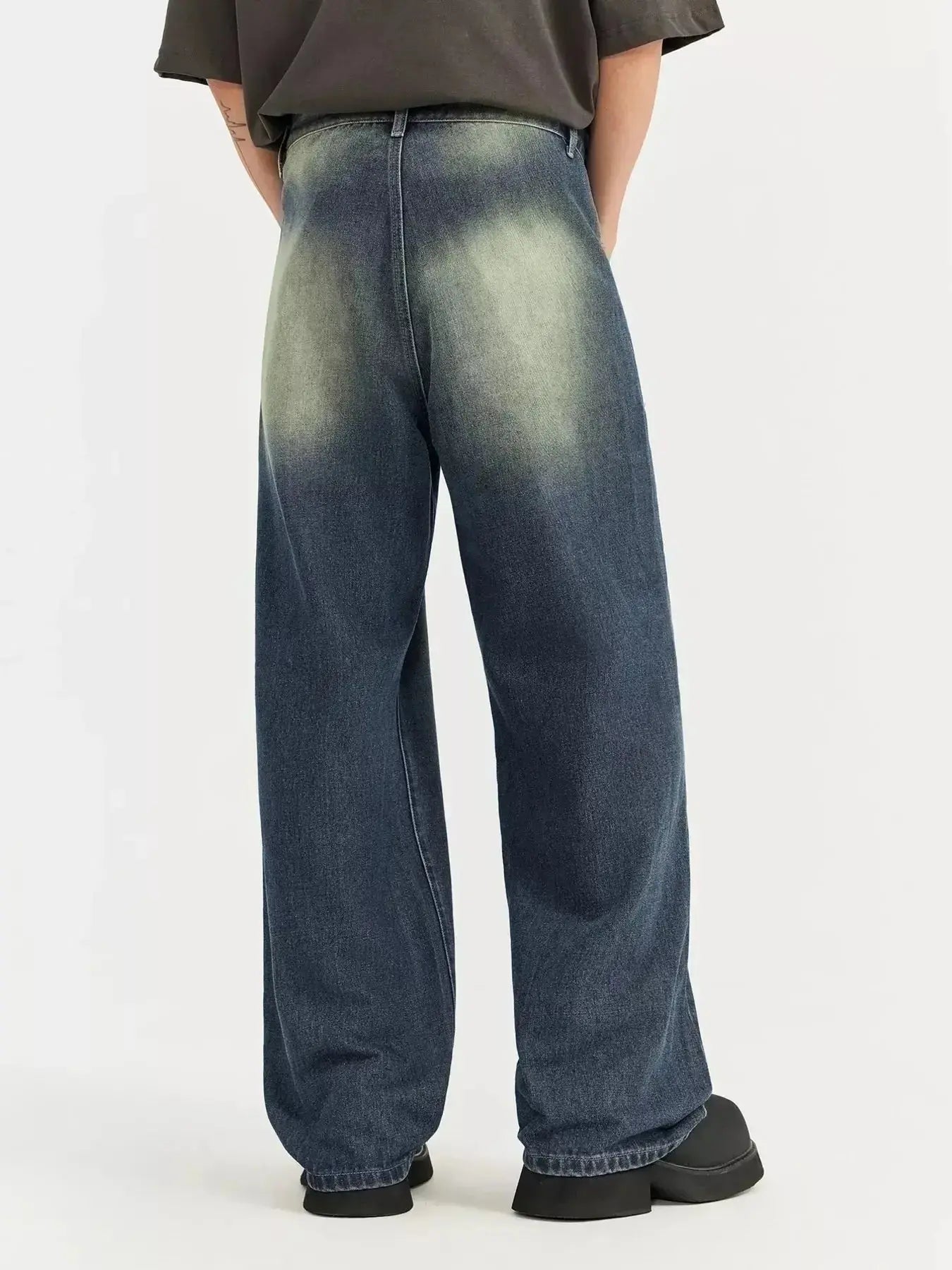 Men's vintage wash wide-leg denim jeans from Trendsi featuring relaxed fit cotton pants with a classic denim look.