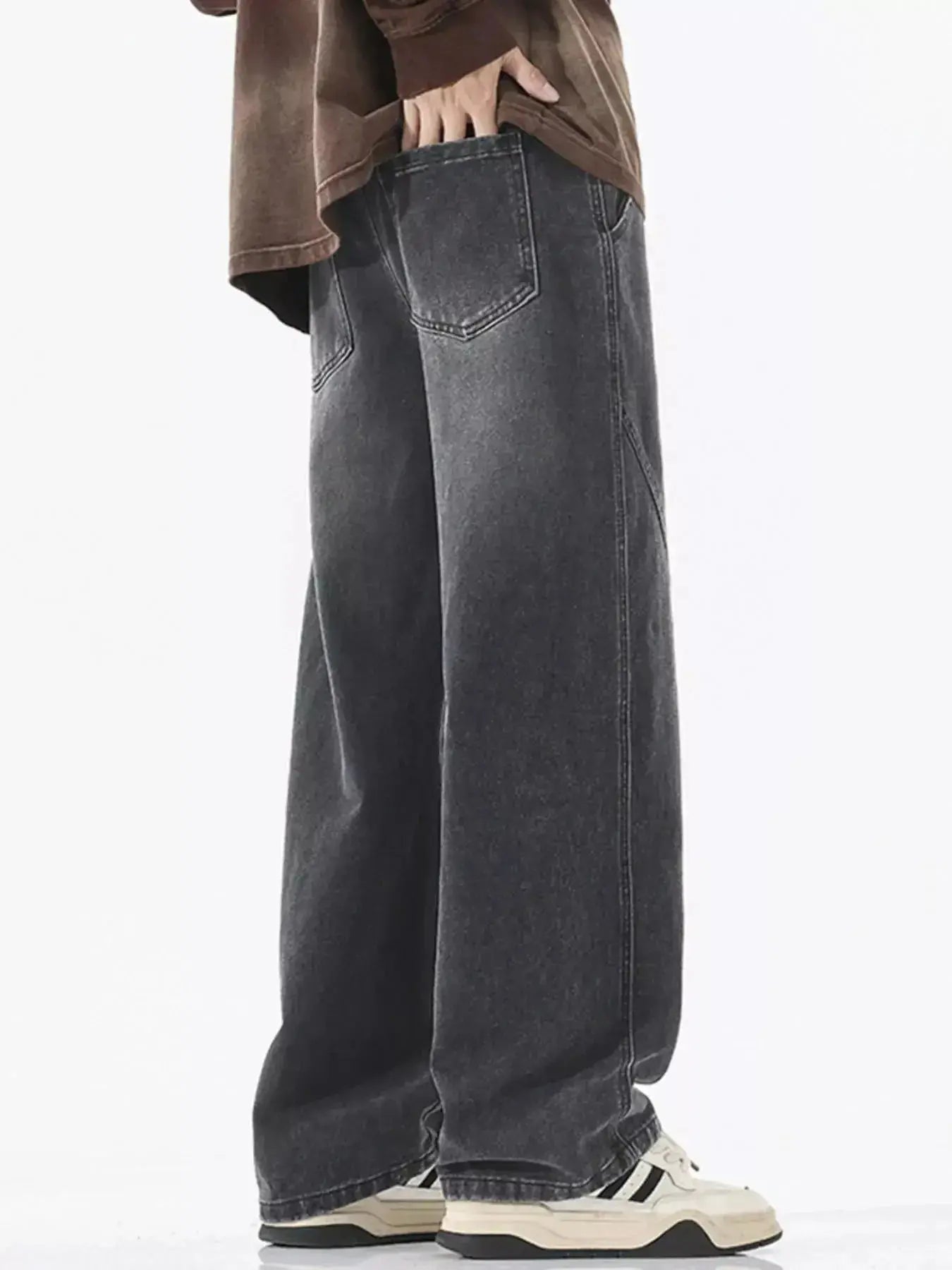 Men's vintage wash wide-leg drawstring jeans with relaxed fit in cotton denim, featuring classic five-pocket design.