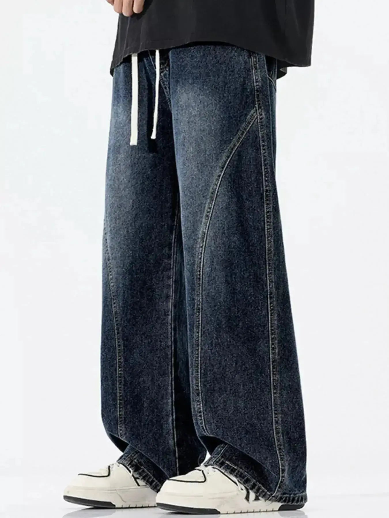 Men's vintage wash wide-leg drawstring jeans by Trendsi, relaxed fit cotton denim with a casual, comfortable style.