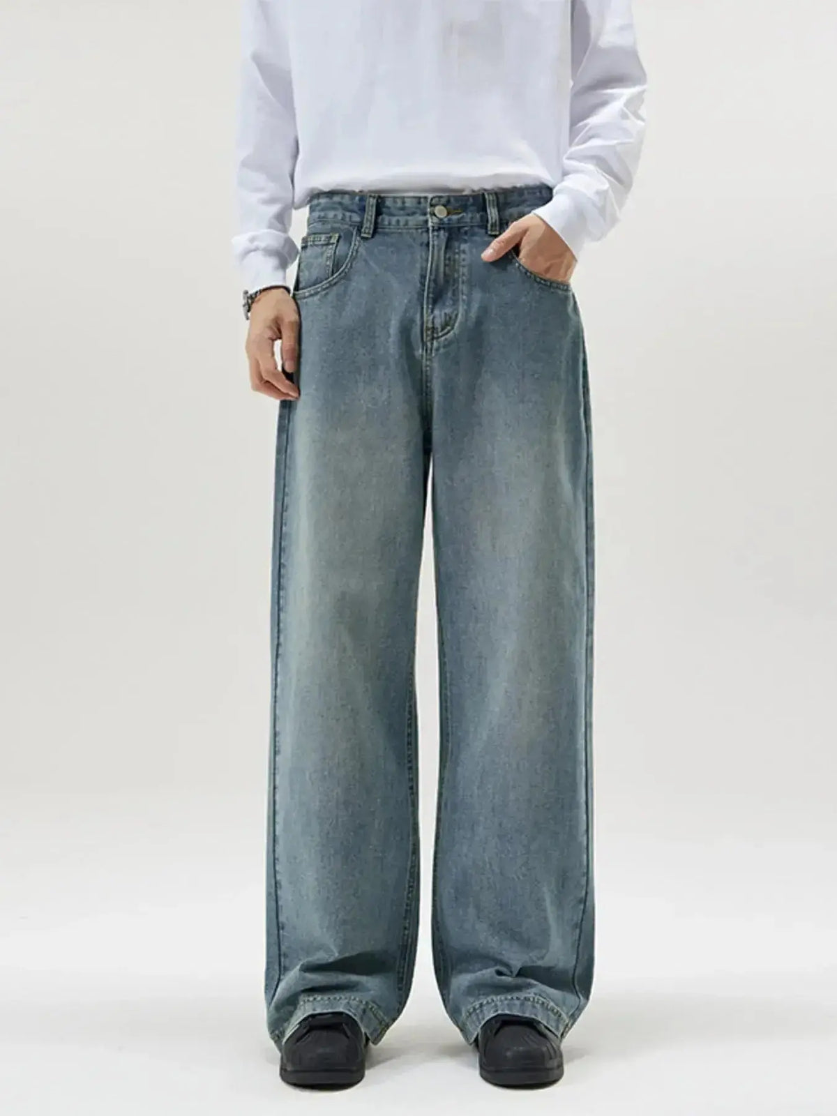 Men's vintage wash wide-leg jeans by Plush Fashion Hub featuring relaxed fit and retro denim style.