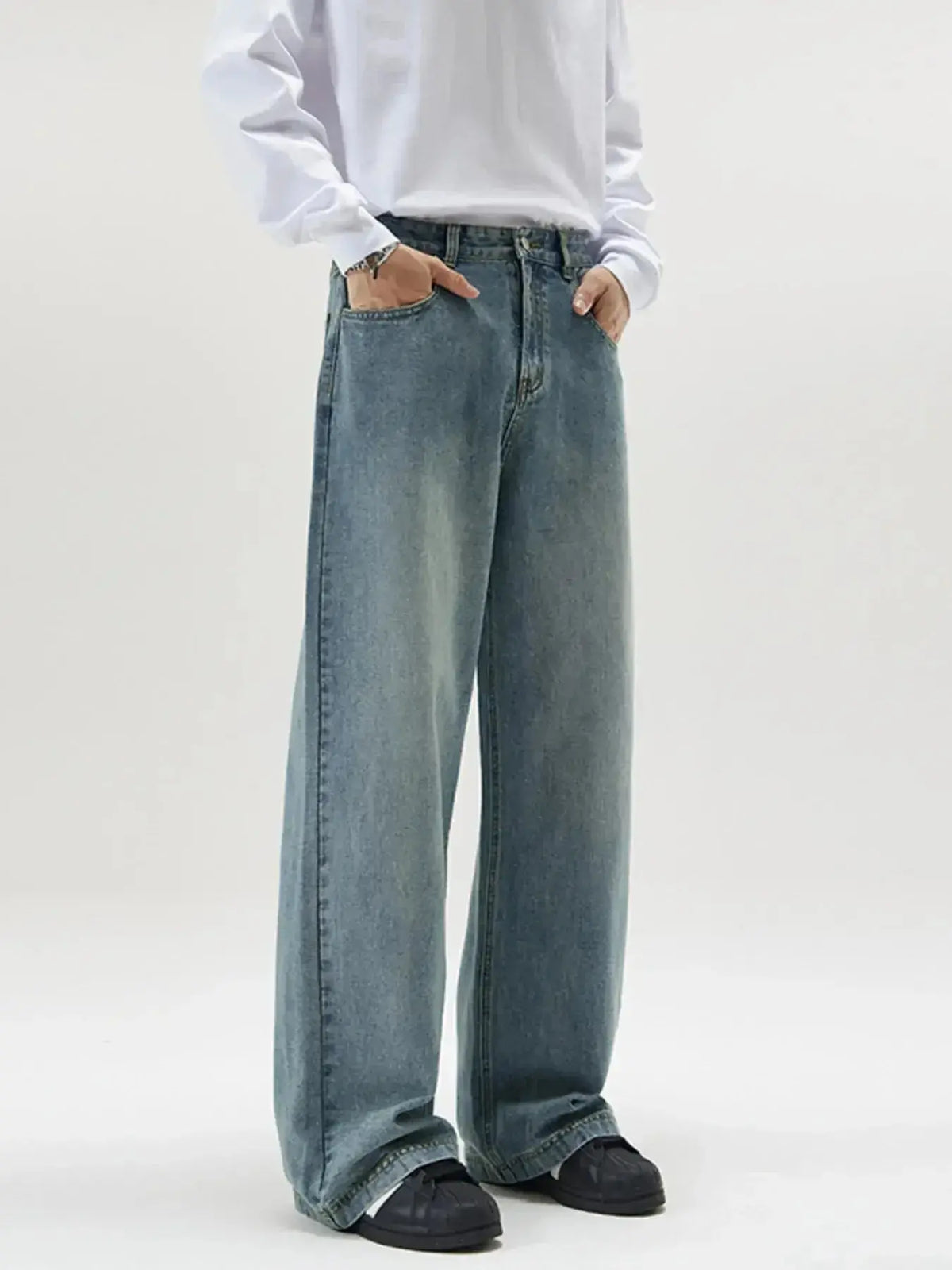 Men's vintage wash wide-leg jeans by Plush Fashion Hub featuring relaxed fit and retro denim style.
