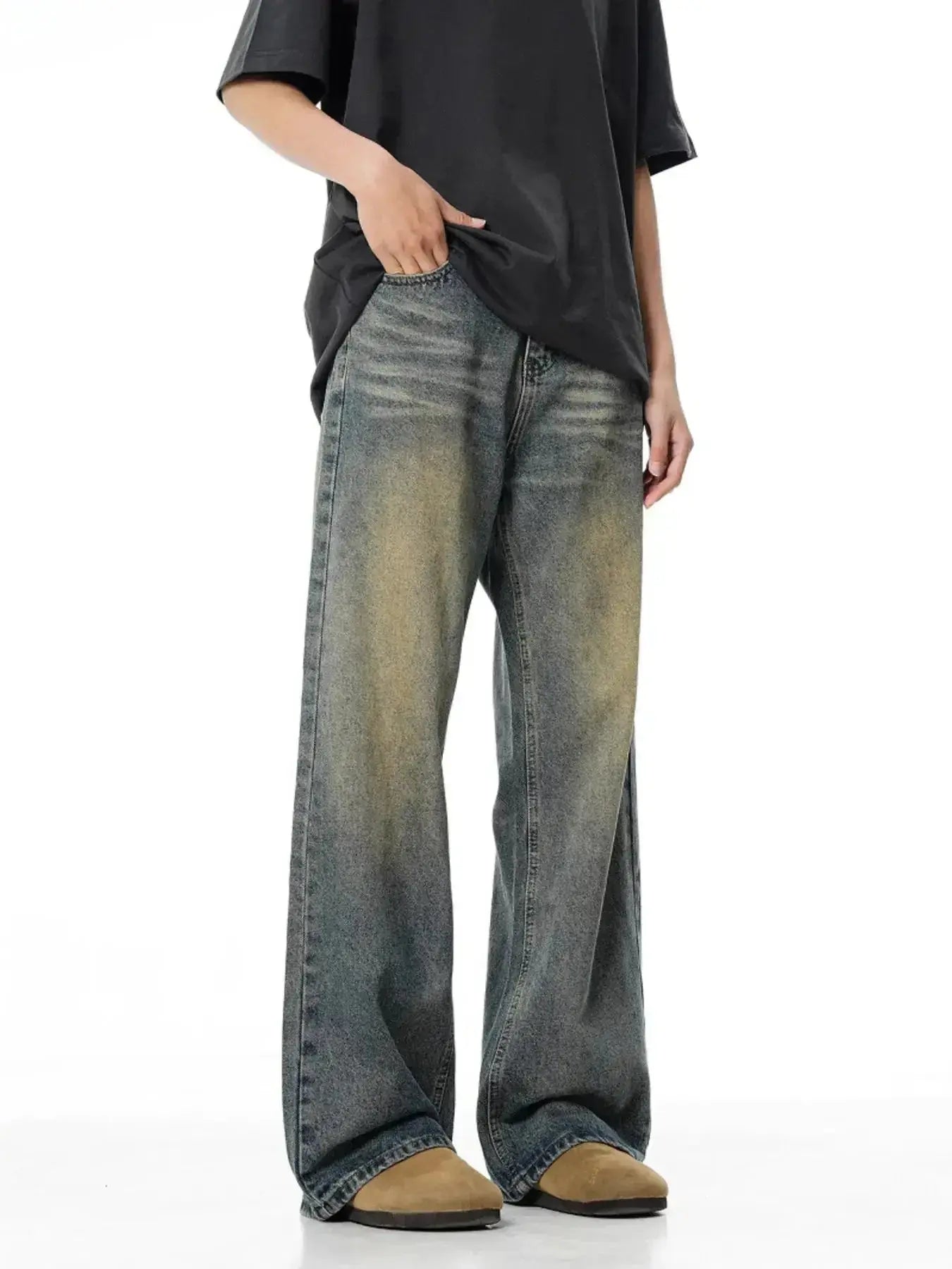 Men's vintage wash wide-leg relaxed fit denim jeans by Trendsi, showing the relaxed fit and classic denim texture.