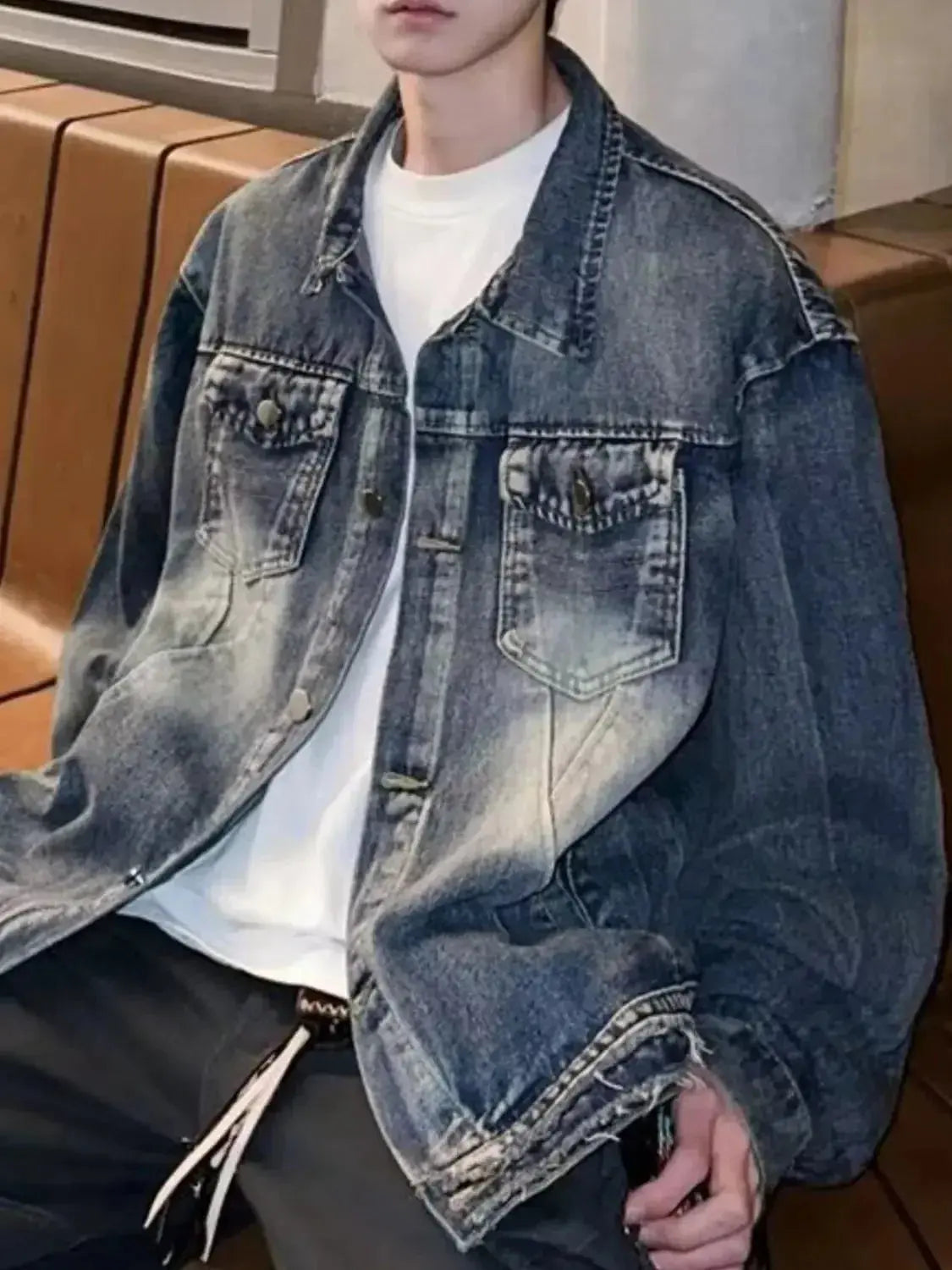 Men's vintage washed denim jacket by Trendsi, durable 100% cotton outerwear, classic denim style, shown on a model.