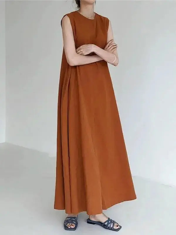 Plush Fashion Hub sleeveless midi dress in solid color with breathable ramie cotton fabric and relaxed fit, minimalist style.