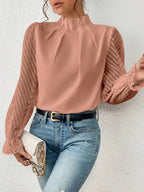 Elegant plush fabric mock neck blouse with flounce sleeves by Plush Fashion Hub, shown in a stylish shirt design.