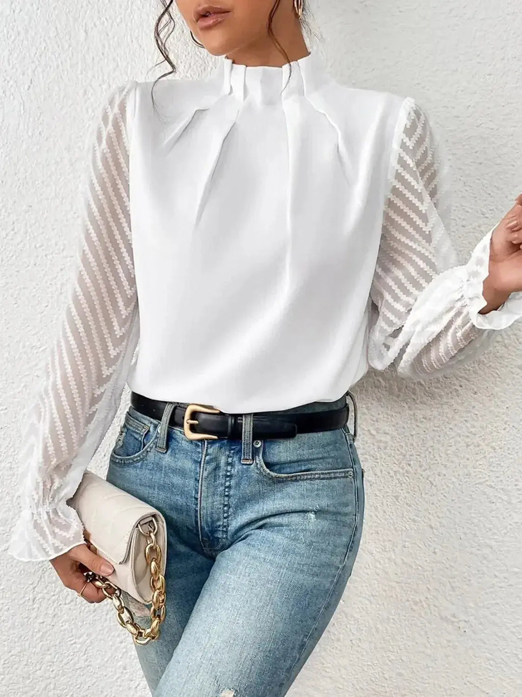 Elegant plush fabric mock neck blouse with flounce sleeves from Plush Fashion Hub, shown in a stylish close-up view.