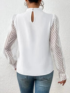 Elegant plush pink mock neck blouse with flounce sleeves, stylish shirt by Plush Fashion Hub.