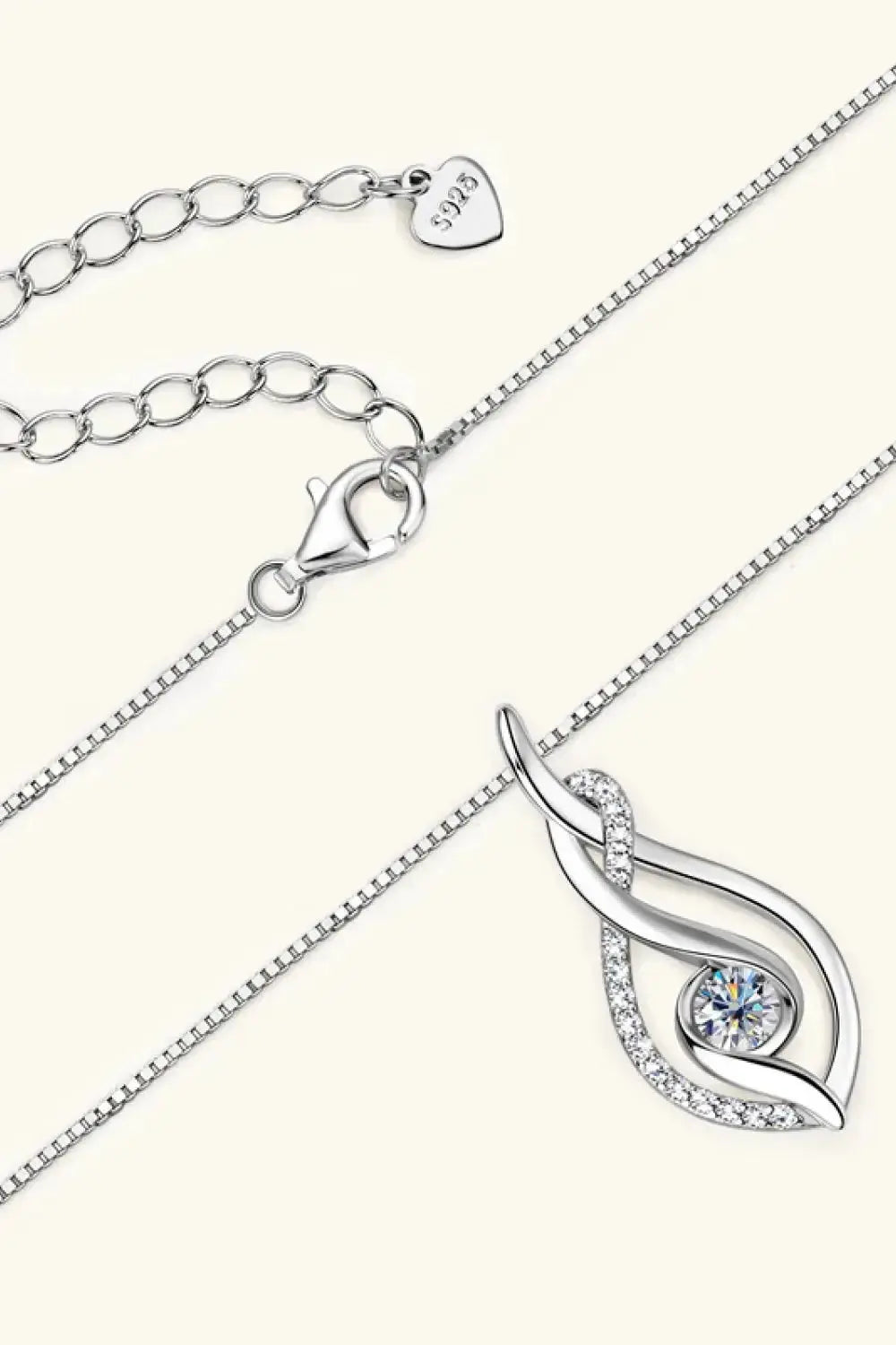Moissanite 0.3ct necklace in 925 sterling silver with 18K gold accents, elegant jewelry piece featuring a sparkling gemstone.