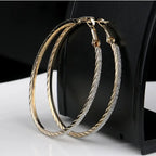 Modern multilayer forked circle earrings in two-tone gold and silver, stylish jewelry by Plush Fashion Hub.