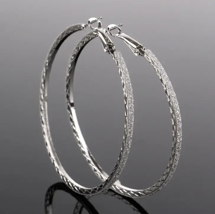 Silver and gold layered forked circle earrings with modern design from Plush Fashion Hub.