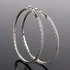 Silver and gold layered forked circle earrings with modern design from Plush Fashion Hub.