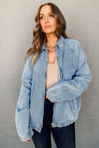Gilded Glamour Shop Myosotis denim jacket with zip-up front, raglan sleeves, and elastic hem, styled for casual wear.