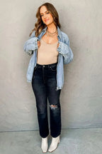 Gilded Glamour Shop Myosotis denim jacket with zip-up front, raglan sleeves, and elastic hem, styled casually.