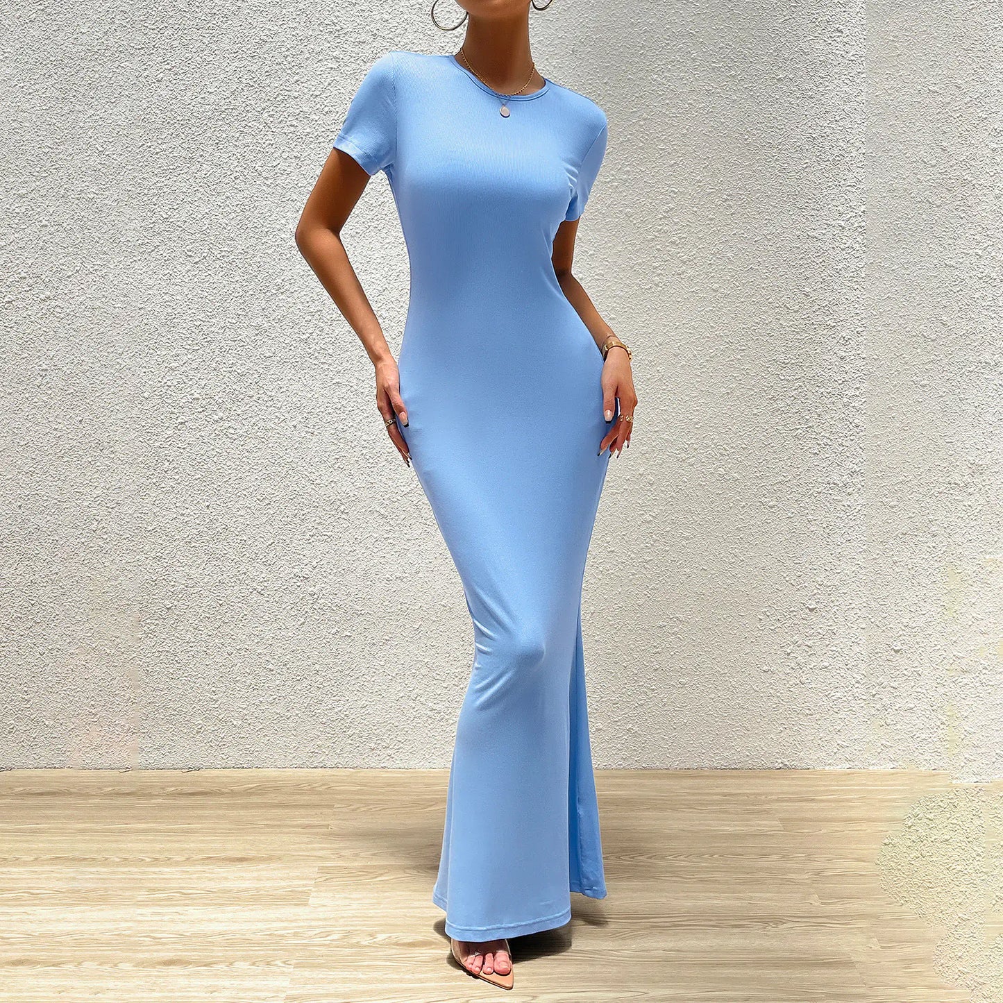 Elegant solid color slim fit round neck women’s dress by Plush Fashion Hub, showcasing a stylish, fitted design in a smooth fabric.