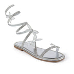 Silver Nancy-1 sandals from The House of Stylez showing side view with open toes and ankle straps on a neutral background.