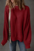 Cream-colored Natalia drop shoulder loose sweater by Threaded Pear, featuring a relaxed fit and soft knit fabric.