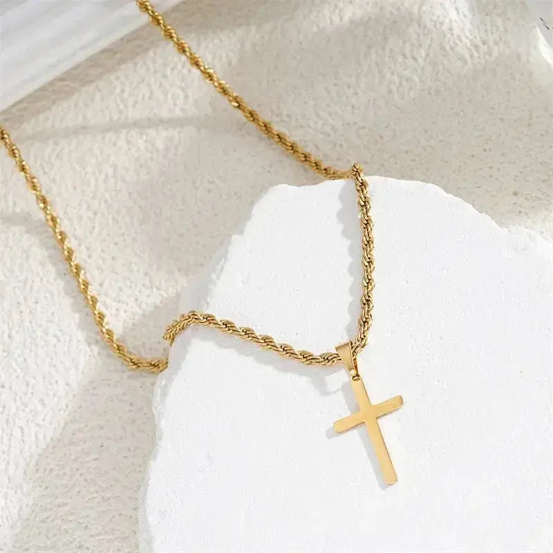 Minimalist gold cross pendant necklace for men and women, unisex jewelry from Plush Fashion Hub with a sleek design.