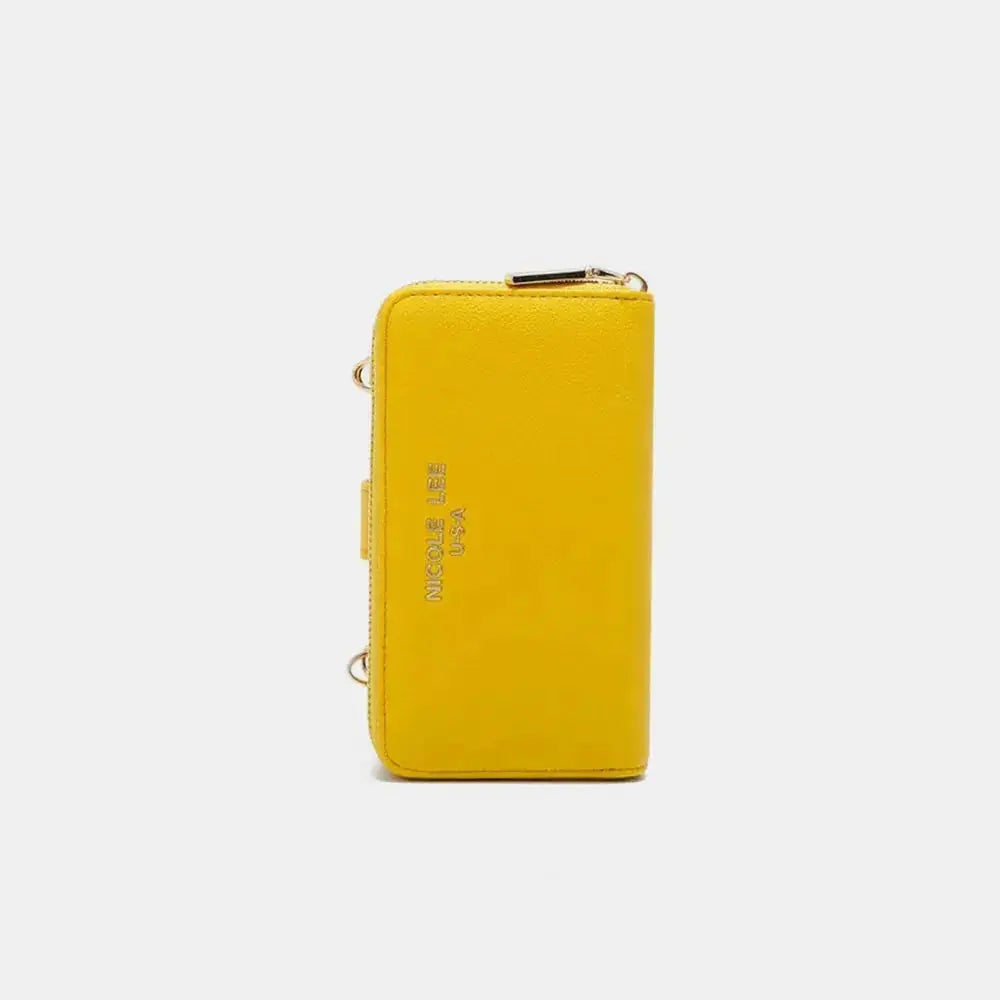 Convertible vegan leather crossbody phone case and wallet by Plush Fashion Hub, featuring multiple compartments and a sleek design.
