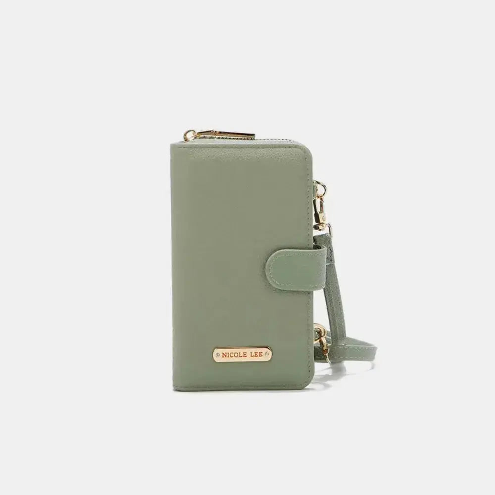 Convertible vegan leather crossbody phone case and wallet by Plush Fashion Hub, featuring sleek design and multiple compartments.