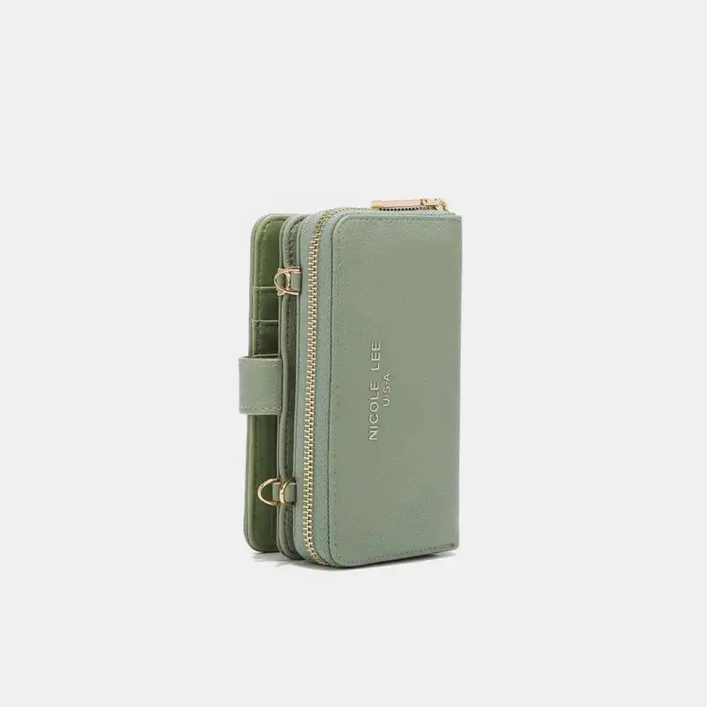 Convertible vegan leather crossbody phone case and wallet by Plush Fashion Hub, with compartments and adjustable strap, in black.