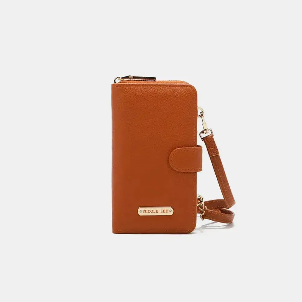 Convertible vegan leather crossbody phone case and wallet by Plush Fashion Hub, featuring a sleek design and practical storage.