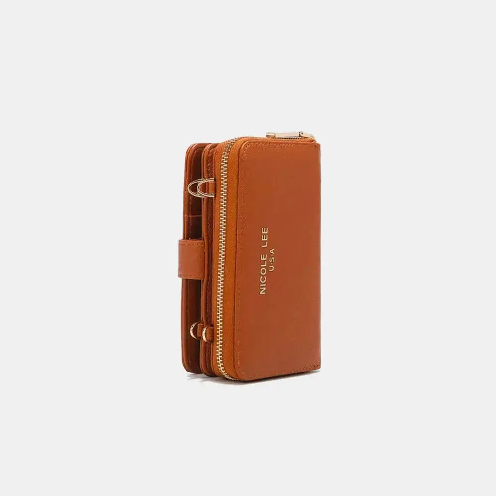 Convertible vegan leather crossbody phone case and wallet by Plush Fashion Hub, featuring a stylish design and functional compartments.