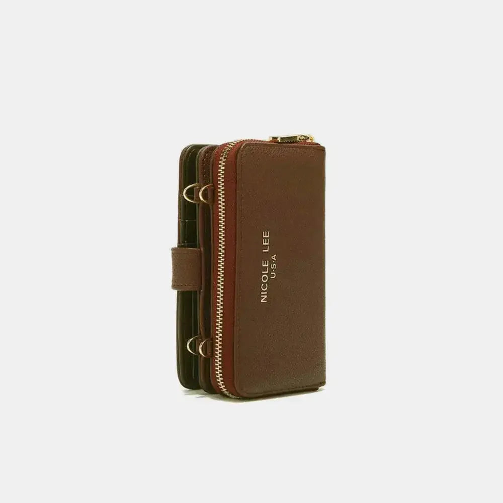 Convertible vegan leather crossbody phone case and wallet by Plush Fashion Hub, with compartments for phone and cards.