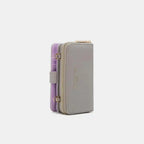 Convertible vegan leather crossbody phone case and wallet by Plush Fashion Hub, featuring a sleek design and multiple compartments.