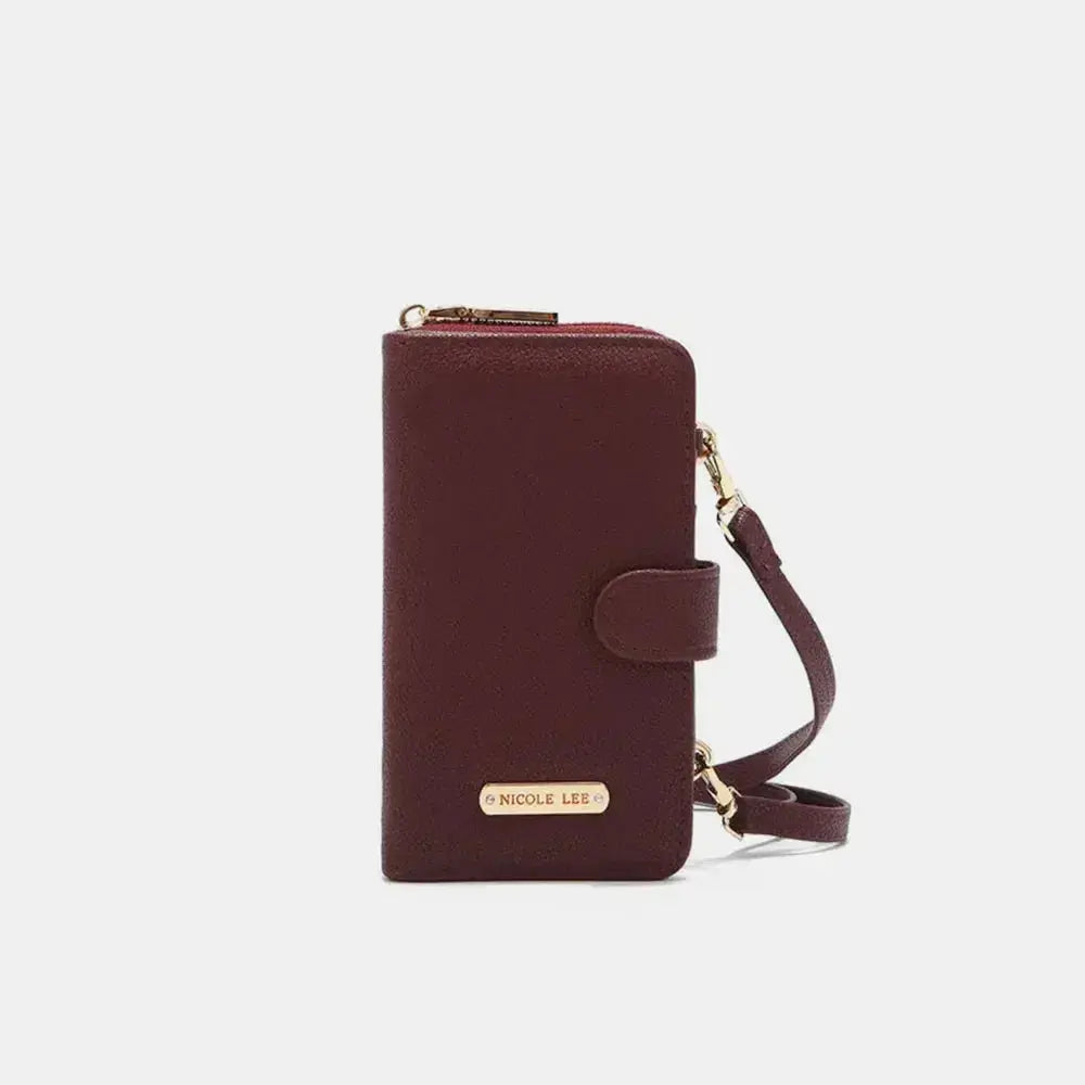 Convertible vegan leather crossbody phone case and wallet by Plush Fashion Hub, featuring a sleek design with multiple compartments.