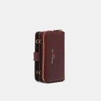Vegan leather convertible crossbody phone case and wallet by Plush Fashion Hub, featuring a stylish design with multiple compartments.