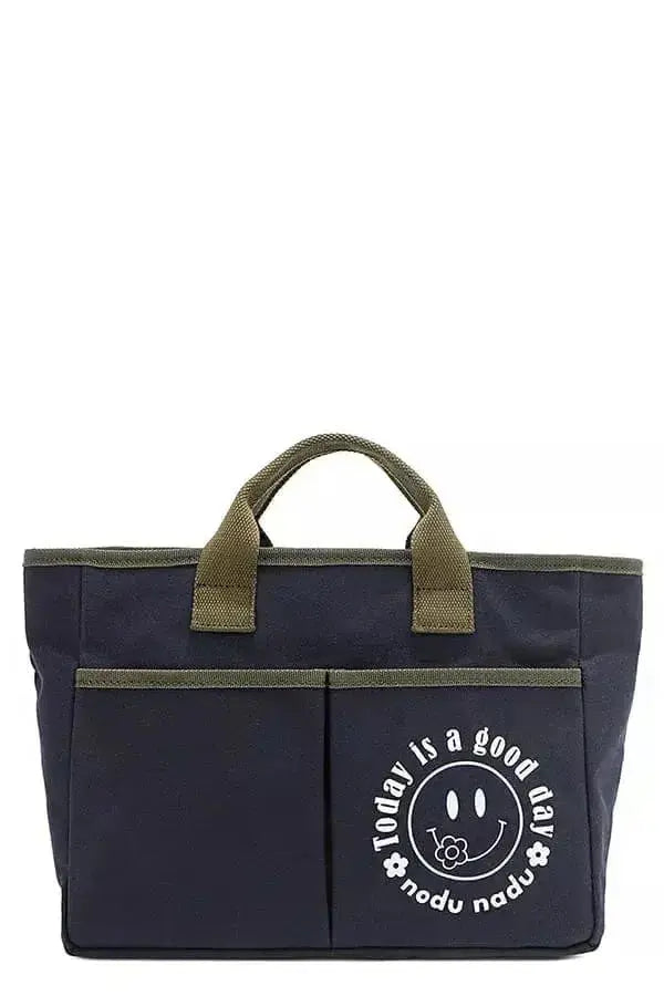 Artistic graphic print canvas tote bag by Plush Fashion Hub, spacious casual handbag with vibrant design and sturdy handles.