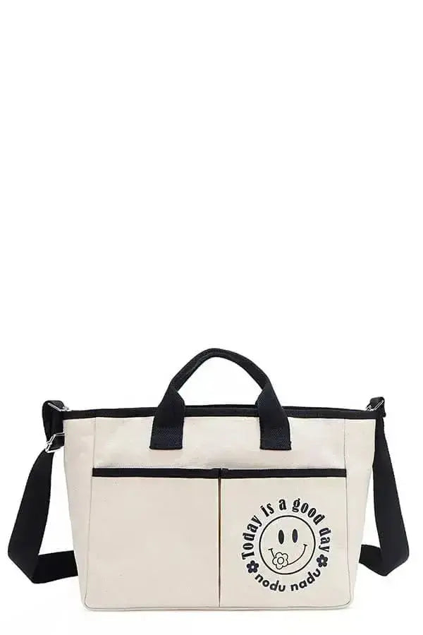 Artistic graphic print canvas tote bag by Plush Fashion Hub, spacious casual handbag with stylish design and sturdy handles.