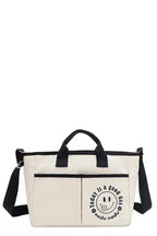 Artistic graphic print canvas tote bag by Plush Fashion Hub, spacious casual handbag with stylish design and sturdy handles.