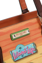 Vegan leather shopper tote bag with tropical beach house print, featuring spacious design and sturdy handles by Plush Fashion Hub.