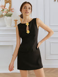 Women’s sleeveless elegant dress with rose front buttons, round neck, and waist trimming by Plush Fashion Hub.