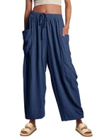 Women’s high waist wide-leg cotton linen trousers with pleats and elastic waist, casual and loose fit, from Wanita Store.